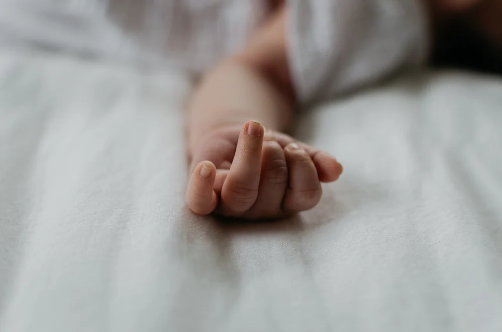Close up of little newborn fingers