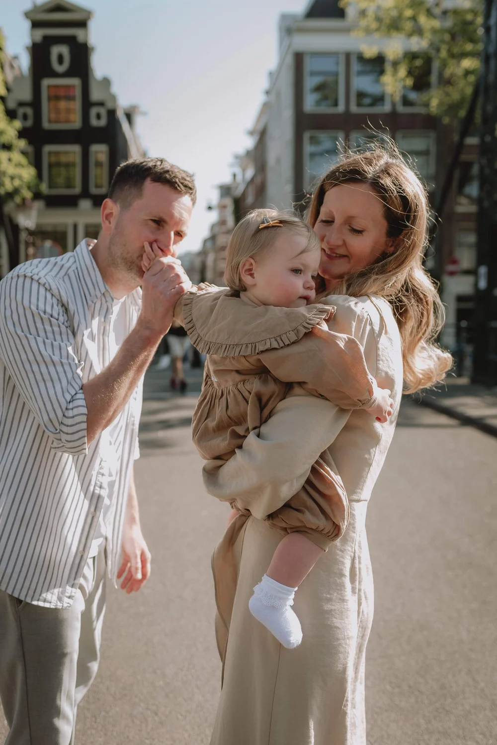 Family on a bridge in Amsterdam