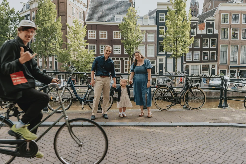 Amsterdam Family Photographer_Vicky McLachlan_Funny photos of people on bicycles in my photos in Amsterdam_1-1-11.png