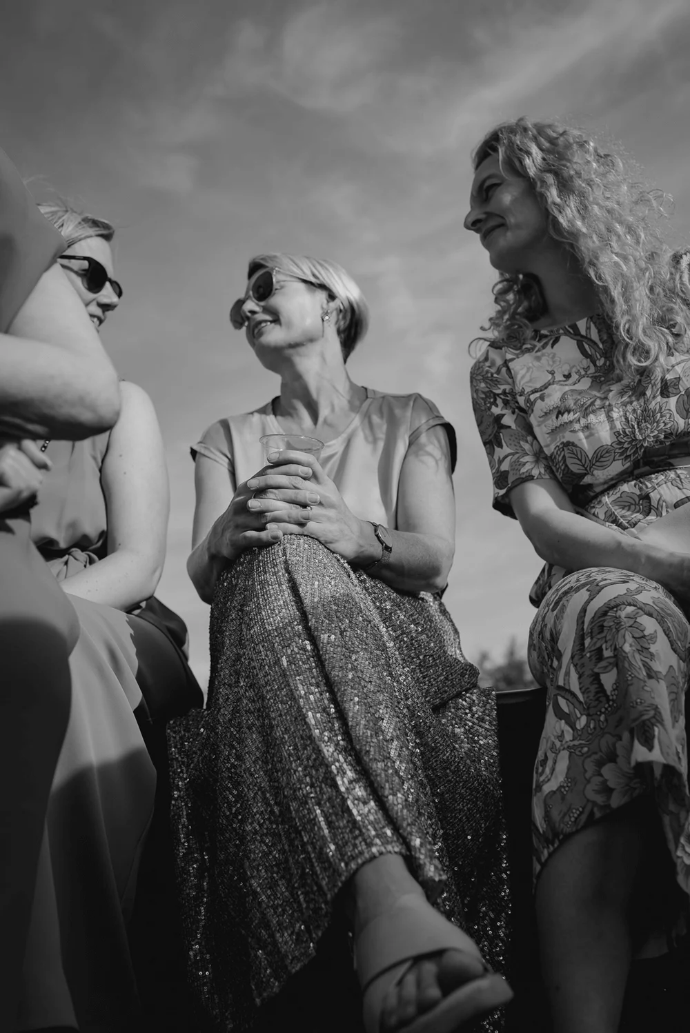 Small Wedding in Haarlem by Vicky McLachlan Photography_Family on a boat with the wedding party after the wedding.png